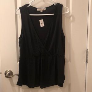 Sleeveless blouse with semi sheer front